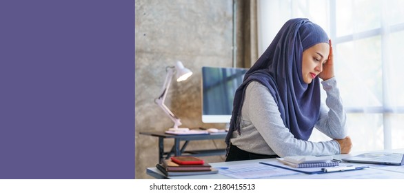 Young Muslim Woman Working In Business Office, Wearing Hijab Works As Start Up SMEs Project, Headache, Migraine, Stress Disorder, Working Hard.