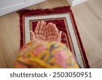 young muslim women hand praying at home 