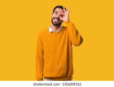 Young natural man confident doing ok gesture on eye - Shutterstock ID 1356209312
