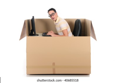 Young Nerd, Geek Man Having A Chat Session, Chat Box, Cardboard Box Representing Chat Room.  Studio, White Background