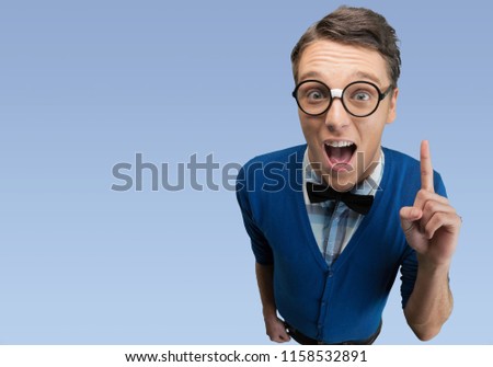 Young nerd man posing on background