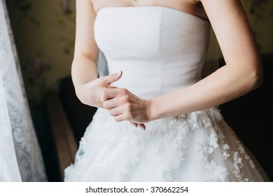 Young Nervous Bride In A White Wedding Dress