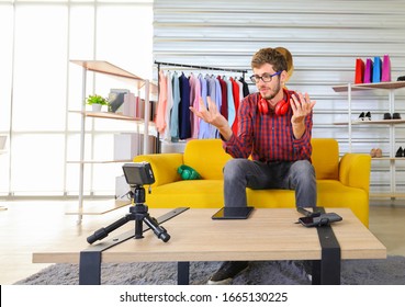 Young Net Idol Content Creator Who Work From Home Filming And Listening For Music Reaction On Live Broadcast For Online Vlogging With Copy Space