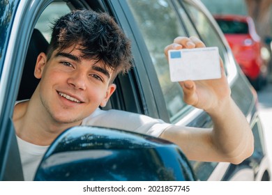 young nobel in the car with driver's license - Powered by Shutterstock