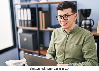 Young non binary man business worker using laptop working at office - Shutterstock ID 2253546117