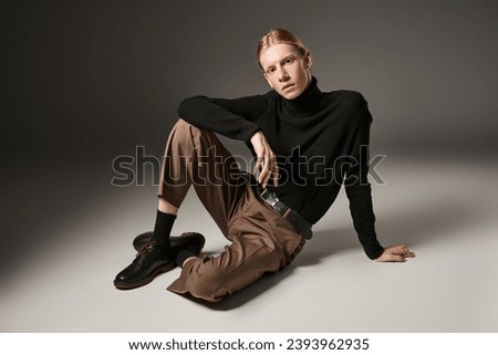 Similar – Image, Stock Photo Charming non binary looking through ring lamp near eyeshadow