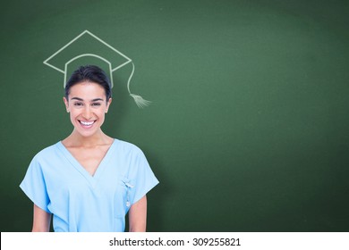 Young Nurse In Blue Tunic Against Green