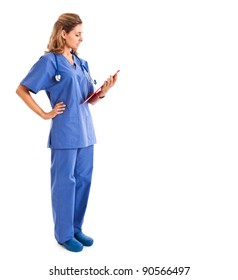 Young Nurse Full Length Portrait Reading A Clipboard