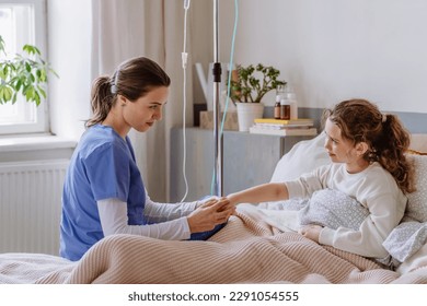 Young nurse taking care of teenage girl. - Powered by Shutterstock