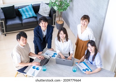 Young Office Worker At A Venture Company