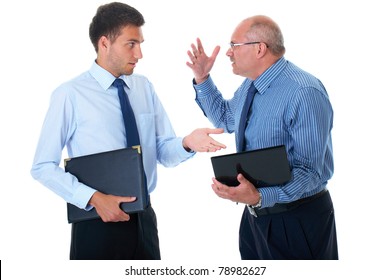 Young And Older Businessman Have Argument Over Their Work, One Of Them Hold Small Computer, Isolated On White