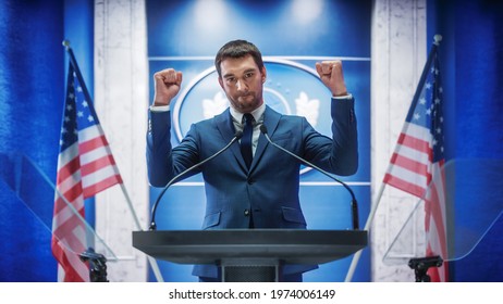 Young Organization Representative Delivers a Successful Speech to Supporters at a Government Election Rally, Clenches his Fists. Minister Speaking on Backdrop with American Flags. - Powered by Shutterstock