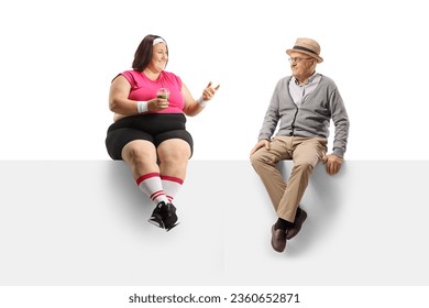 Young overweight woman holding a healthy green smoothie and talking to an elderly man isolated on white background - Powered by Shutterstock