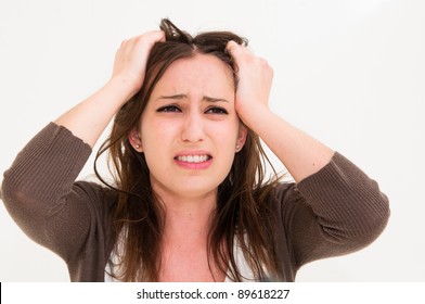 Young Panic Woman With Hands On The Head