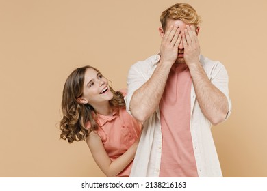 Young Parent Man With Child Teen Girl In Casual Pastel Clothes Dad Little Kid Daughter Close Eyes With Hand Play Guess Who, Hide And Seek Isolated On Beige Background Father's Day Love Family Concept