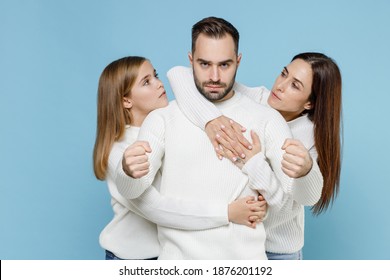 Young Parents Mom Dad With Child Kid Daughter Teen Girl In Basic White Sweaters Hold Hands Like Driving Car Hugging Like Safety Belt Isolated On Blue Background Studio. Family Day Parenthood Concept