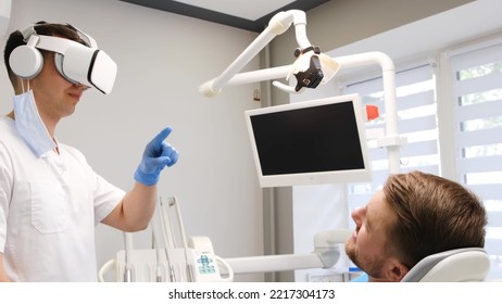 Young patient in a dental chair. Treatment through virtual reality glasses. - Powered by Shutterstock