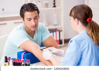 Young Patient During Blood Test Sampling Procedure  