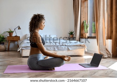 Similar – woman doing yoga by swimming pool. Yoga and mindfulness