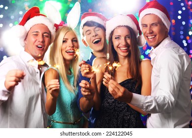 Young People Celebrating Christmas In Club