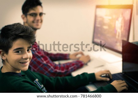 young people with the computer at home