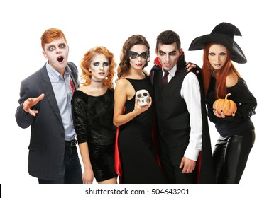 Young People Dressed In Different Costumes For Halloween, Isolated On White