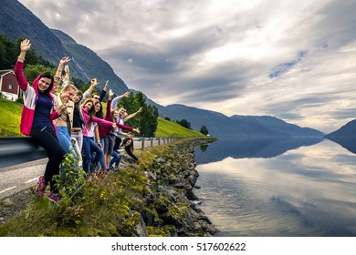 Young People Enjoying The View On The Way Back Home, Norway