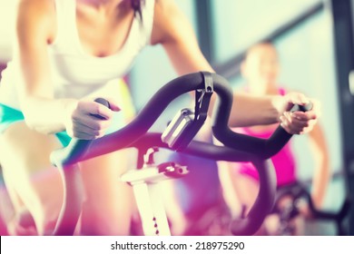 Young People - group of women and men - doing sport in the gym for fitness - Shutterstock ID 218975290
