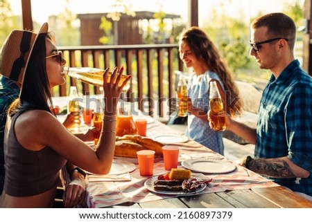 Similar – Image, Stock Photo Young happy couple looking smartphone outdoors in summer