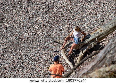 Young people having fun outdoors on the beach. Romantic young couple on the beach.