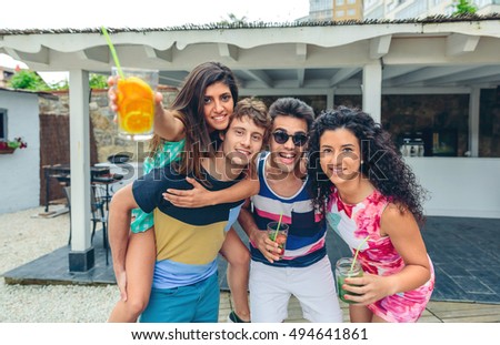 Similar – Group of young people having fun in summer party