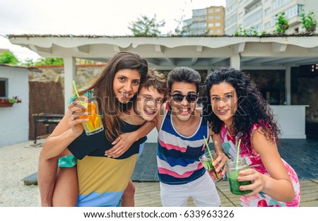 Similar – Group of young people having fun in summer party