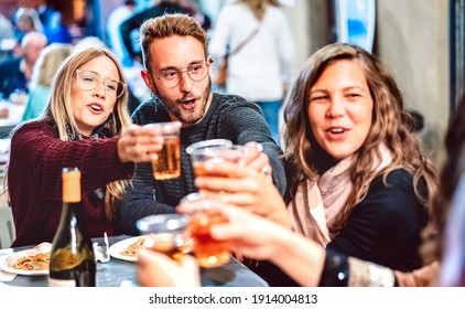 Young People Having Fun Toasting White Wine At Street Food Festival - Happy Friends Eating Local Plates At Restaurant Dehor Together - Travel And Dinning Lifestyle Concept - High Iso On Neon Filter