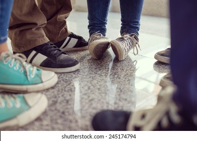 Young People Legs Standing In Circle