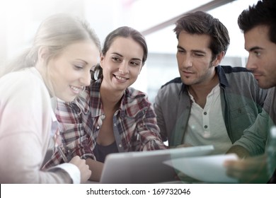 Young People Meeting With Digital Tablet