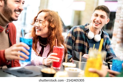 Young People On Genuine Laugh Moment At Fancy Pub Restaurant Outside - Life Style Concept With Trendy Friends Sharing Happy Hour Time Together At Sidewalk Cafe - Vivid Filter With Focus On Asian Woman