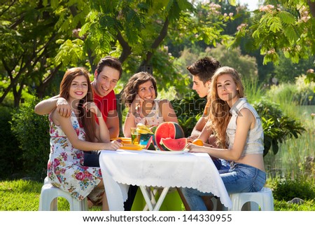 Similar – Group of people having fun in a summer day