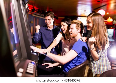 Young People Play Jackpot In The Casino