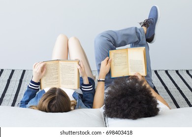 Young people reading book