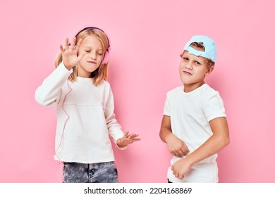 Young People Standing Side By Side Posing Fashion Pink Color Background