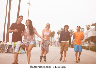 Young People In Their Twenties On The Venice Beach Boaardwalk In California