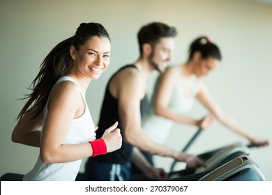 Young People Training In The Gym