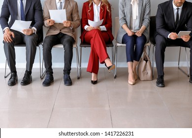 Young people waiting for job interview indoors - Shutterstock ID 1417226231