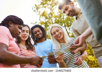 Young People Work Together To Solve A Task In An Outdoor Team Building Game