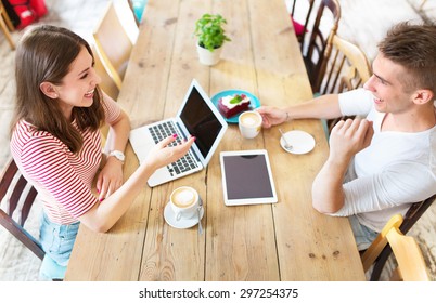 Young People Working At Cafe