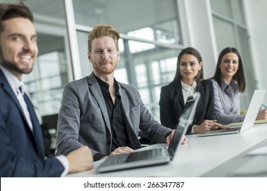 Young people working in the office - Shutterstock ID 266347787