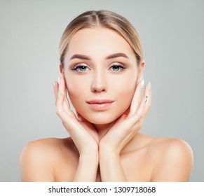 Young perfect female face. Perfect girl with healthy skin. Facial treatment, skincare and cosmetology concept.  - Shutterstock ID 1309718068