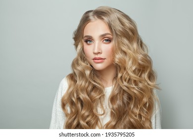 Young perfect woman blonde model with with curly hairstyle on white background - Shutterstock ID 1935795205