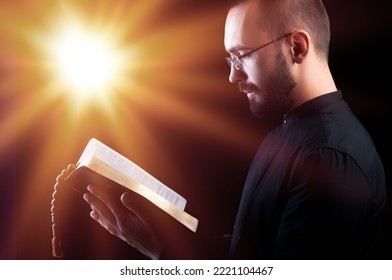 Young Person Holding Bible Book