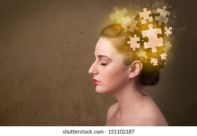 Young Person Thinking With Glowing Puzzle Mind On Grungy Background